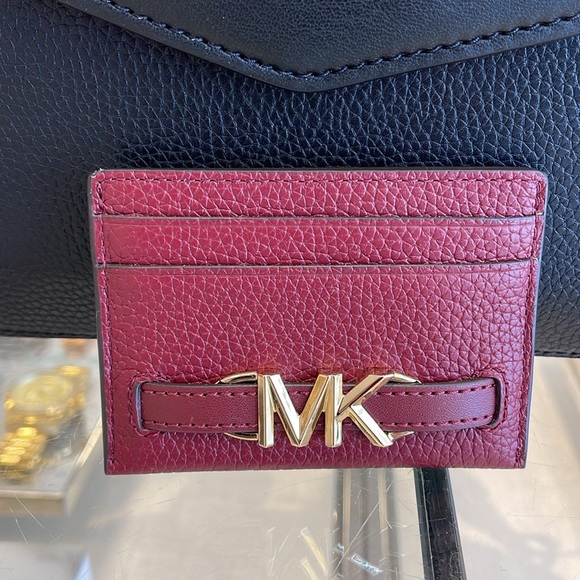 MICHAEL KORS
Reed Large Pebbled Leather Card Holder Case
Dark Cherry 
NWT - Picture 16 of 16